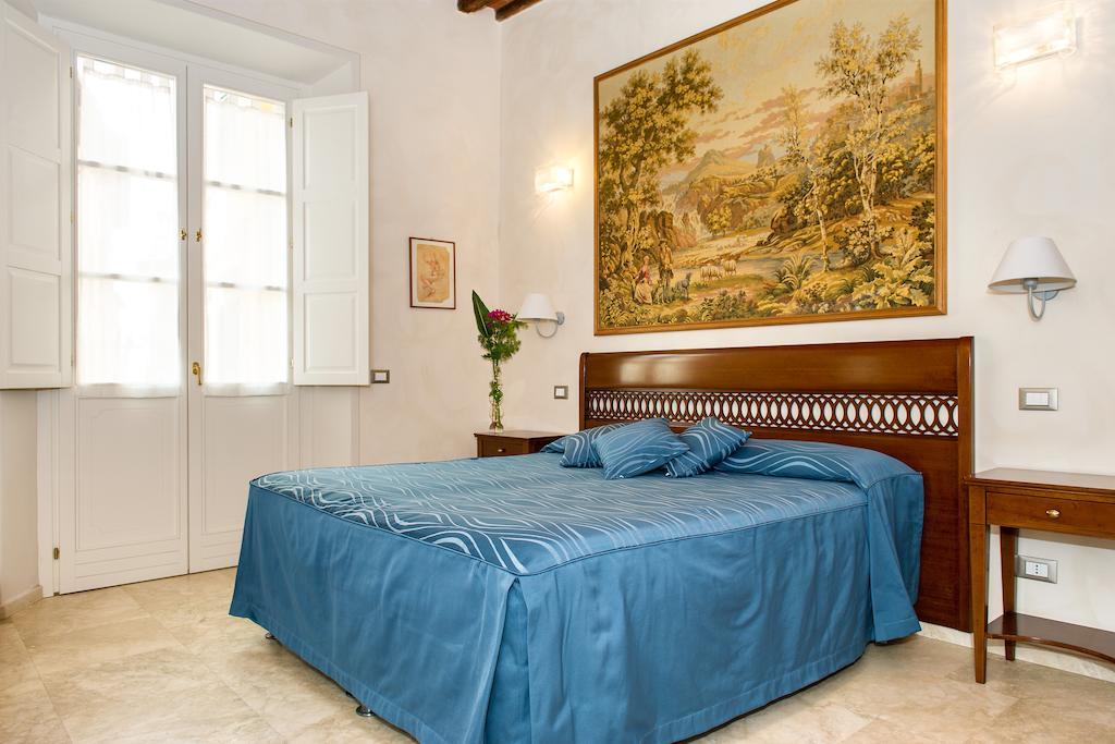 Relais Dei Mercanti B&B And Suites Пиза Стая снимка